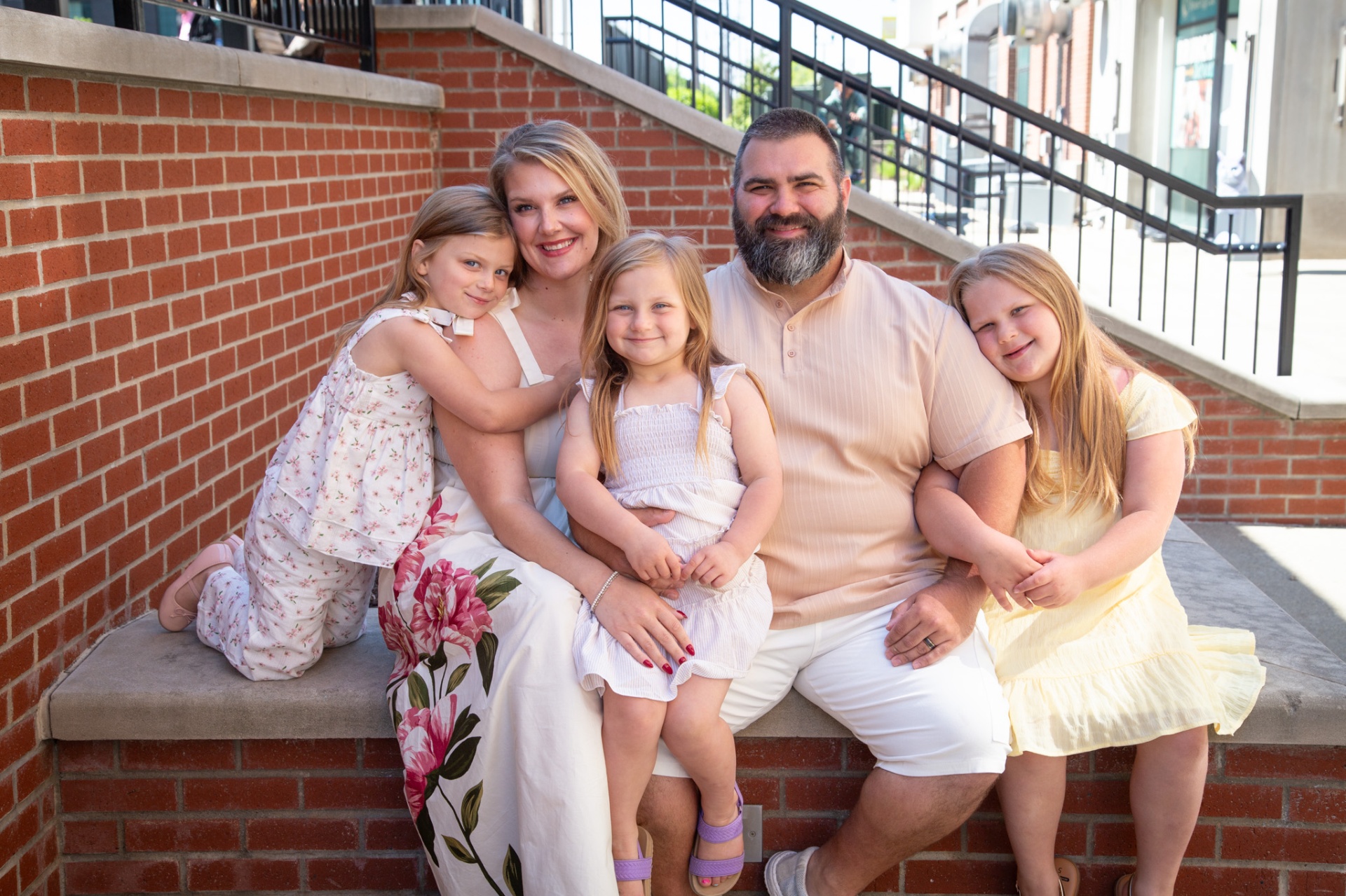 Madison West with her husband and three daughters in Beech Grove